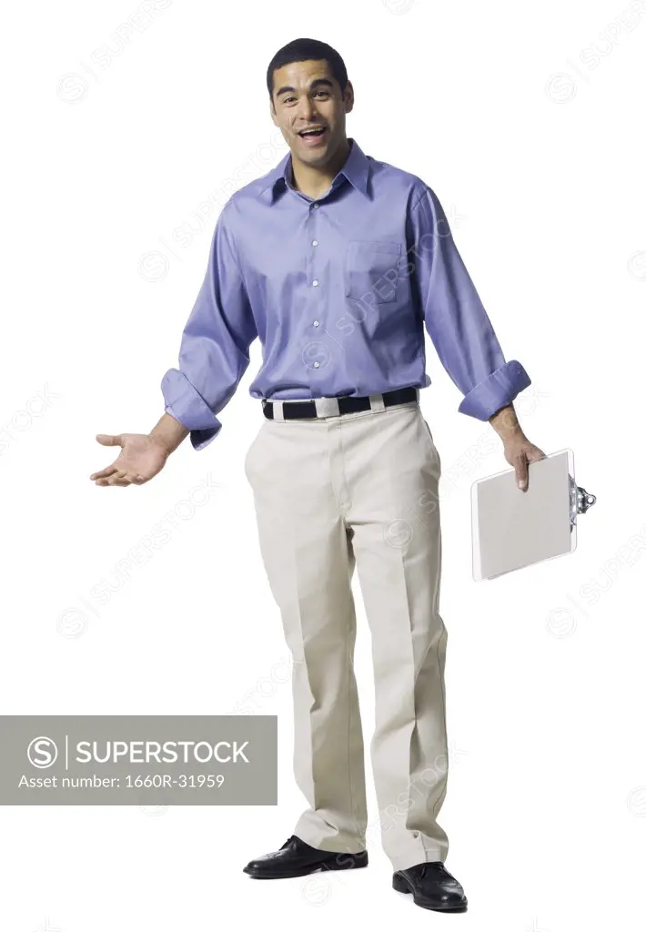 Man standing with clipboard pointing