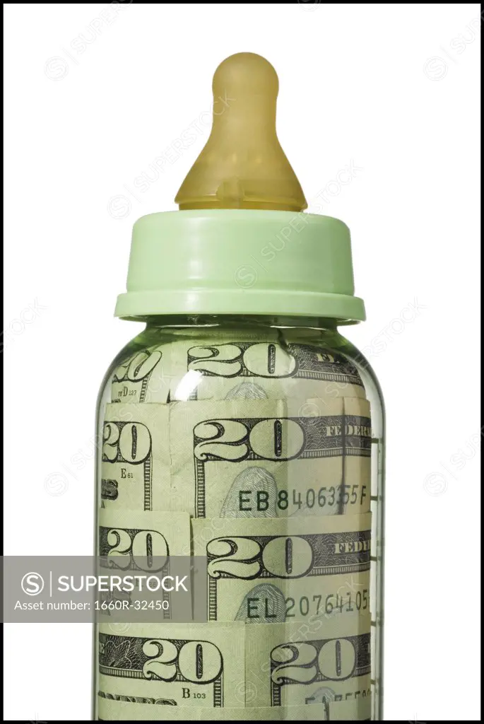 Baby bottle with US currency in it