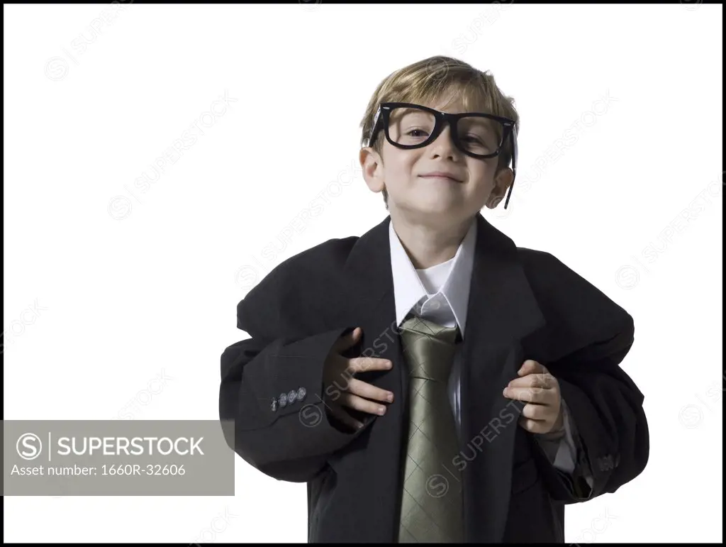 Little boy dressed as business executive