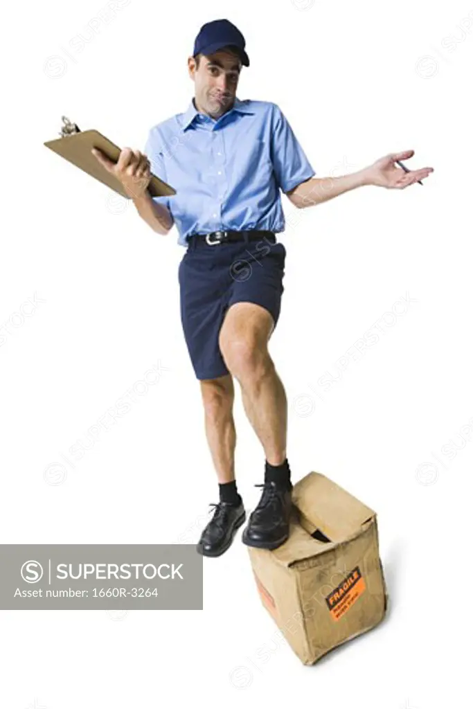 Portrait of a mailman with a clipboard and a package