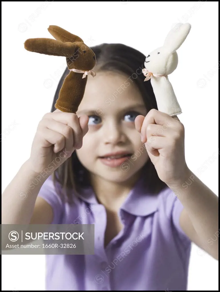 Girl with finger puppets