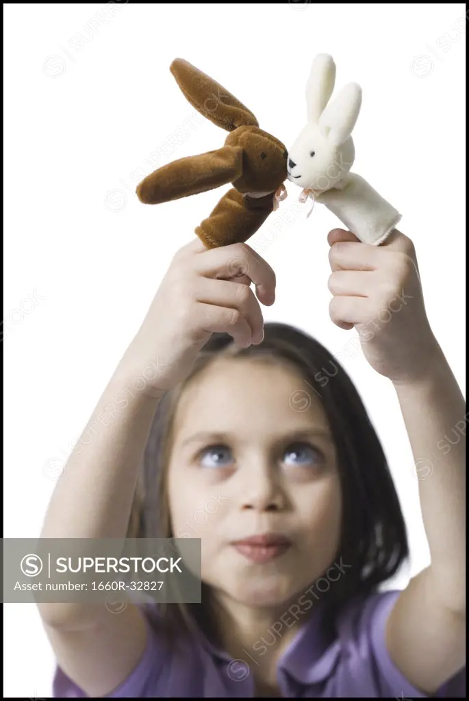Girl with finger puppets