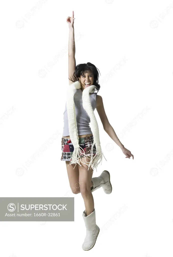 Woman with bare legs and boots dancing