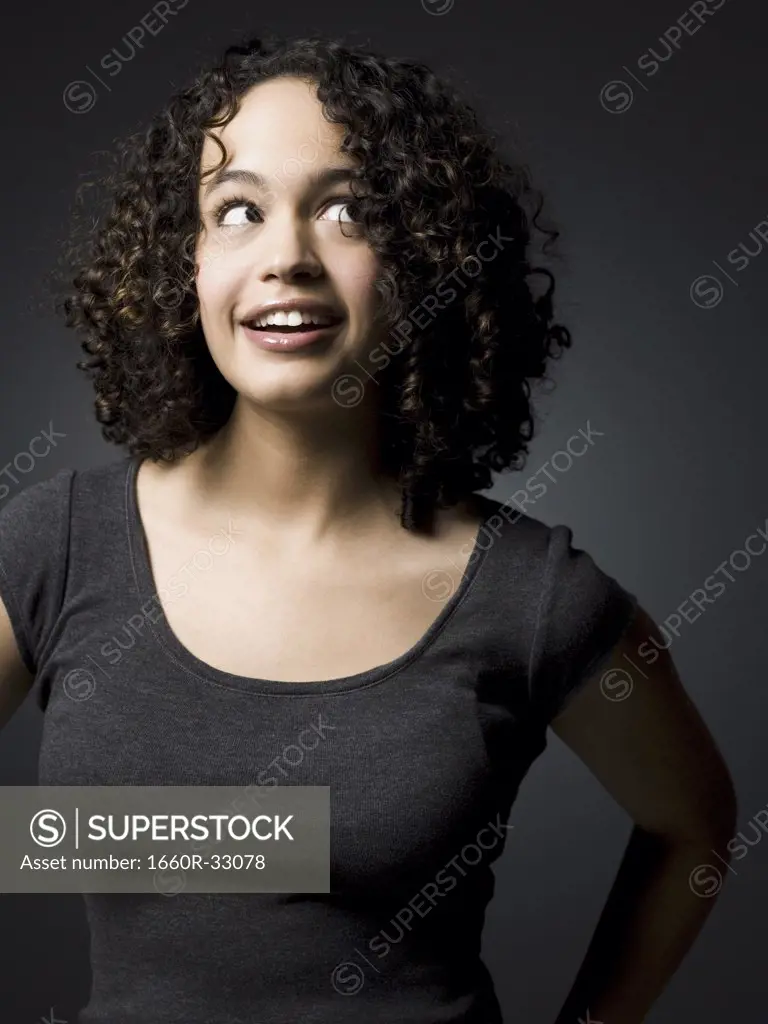 Woman smiling and looking up