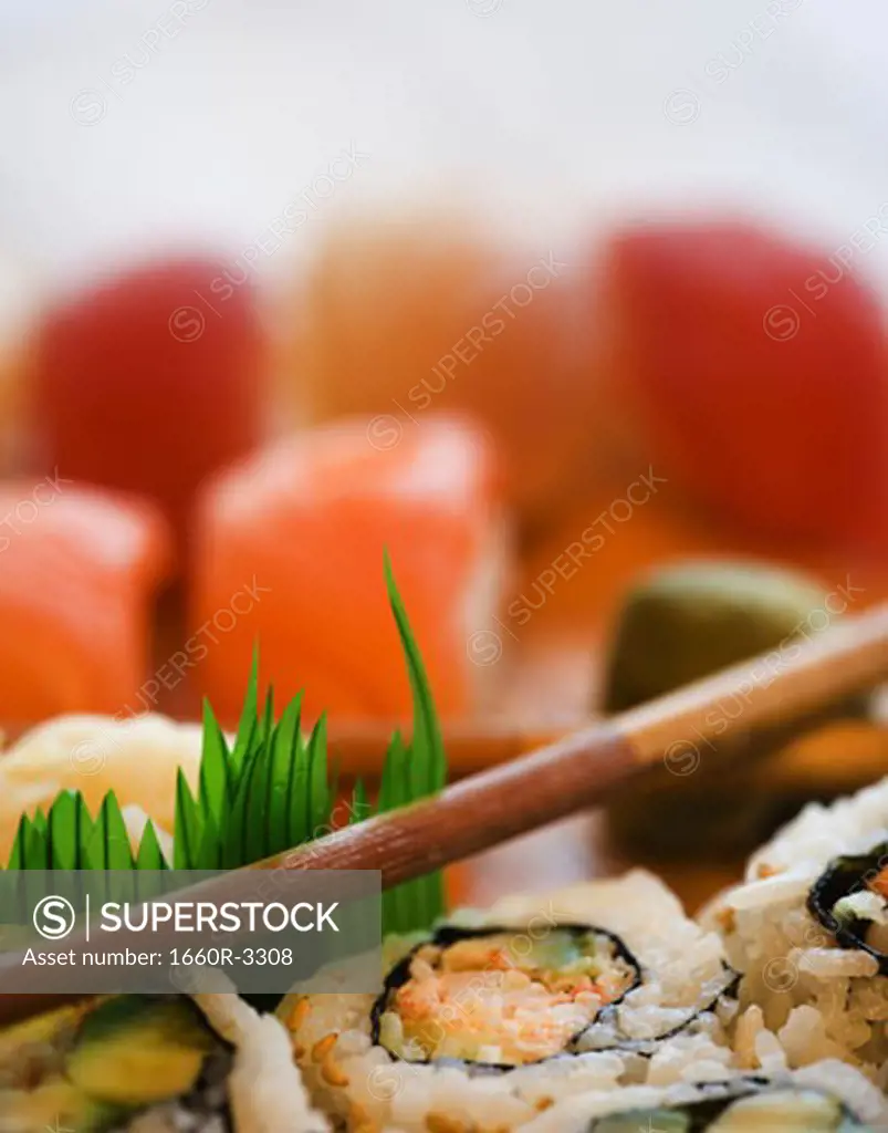 Close-up of sushi and chopsticks
