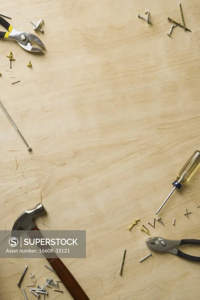 Tools and fasteners on hardwood floor