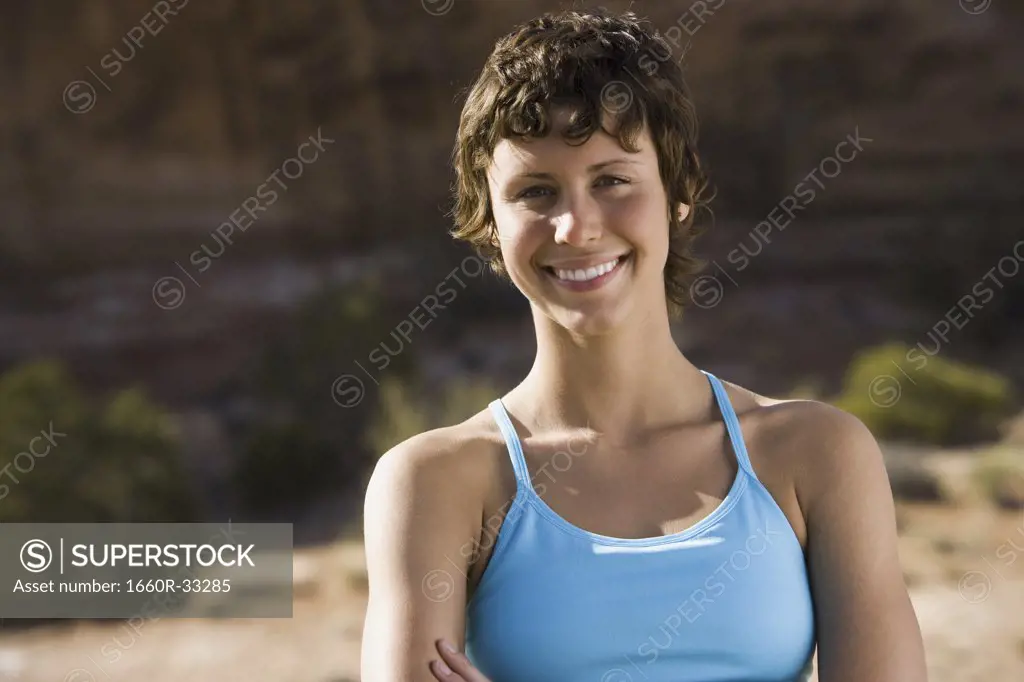 Portrait of a woman smiling outdoors