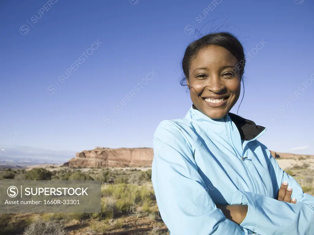 Portrait of a woman smiling outdoors