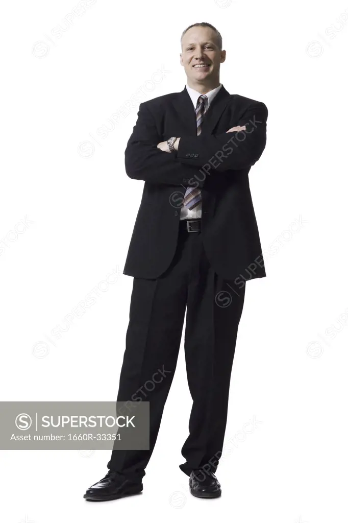 Portrait of a businessman with briefcase smiling