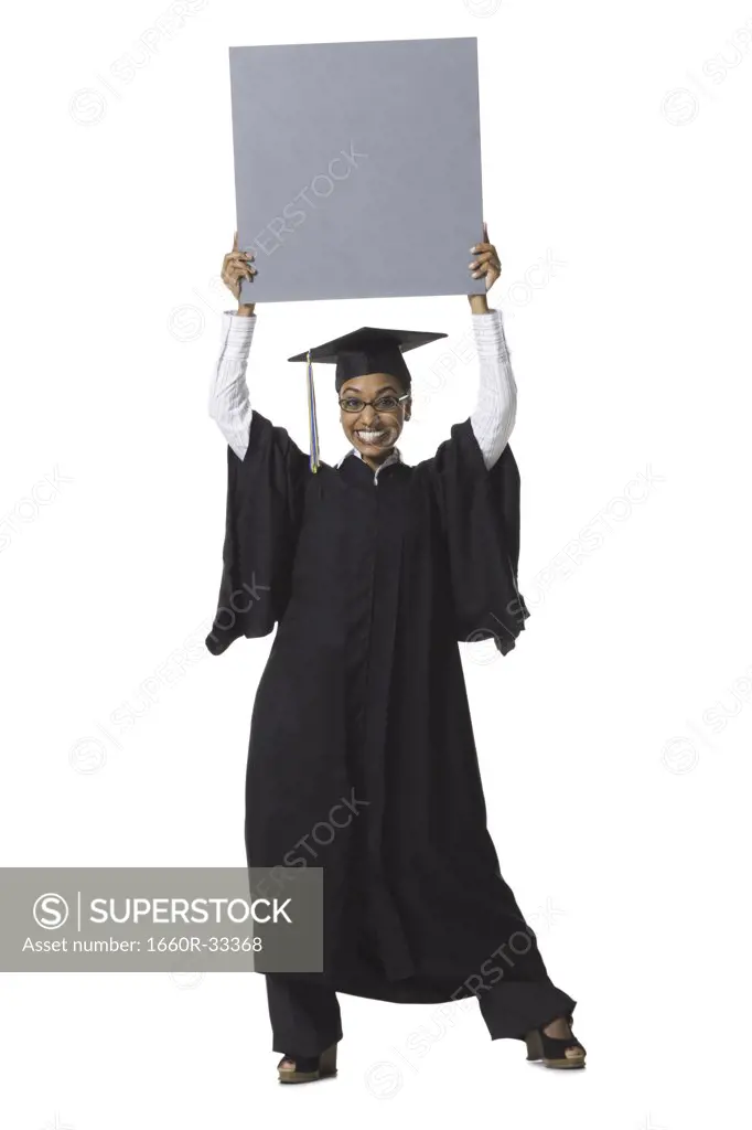 Woman in graduation gown and Blank Sign with blank sign