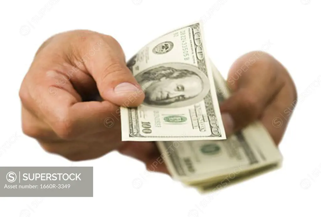 Close-up of hands holding money