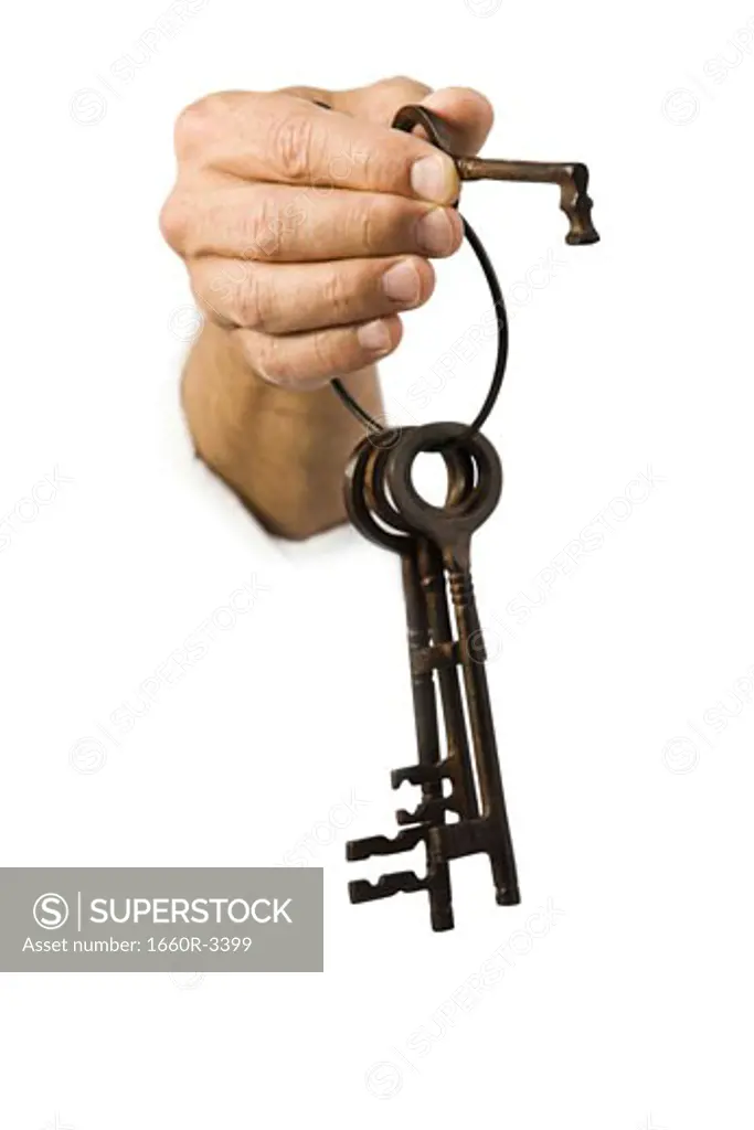 Close-up of a key ring in a man's hand