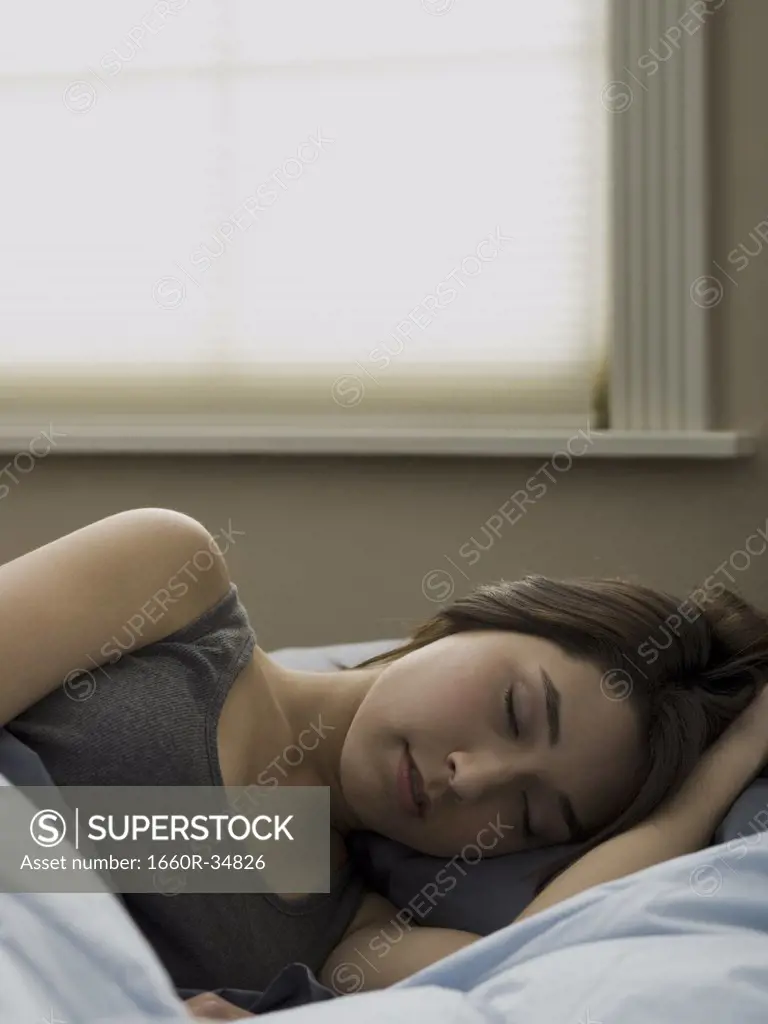 Woman in bed sleeping