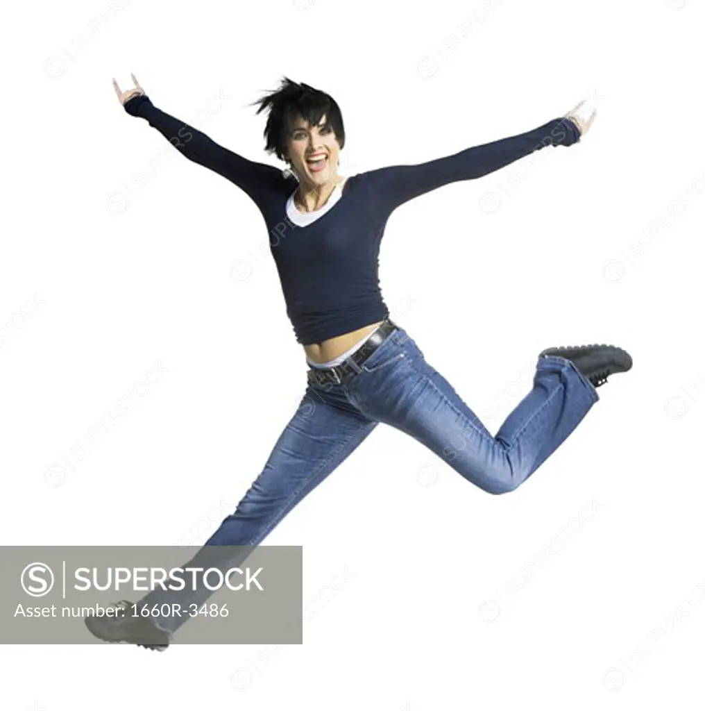 Portrait of an adult woman jumping