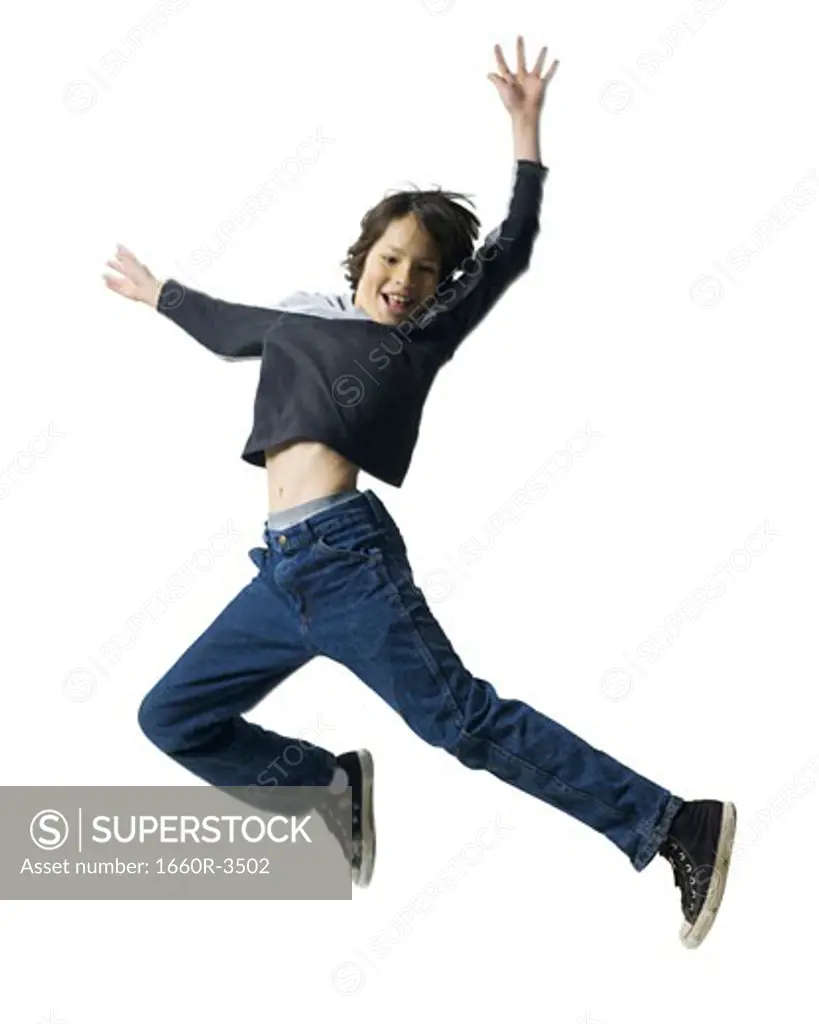 Boy jumping in the air
