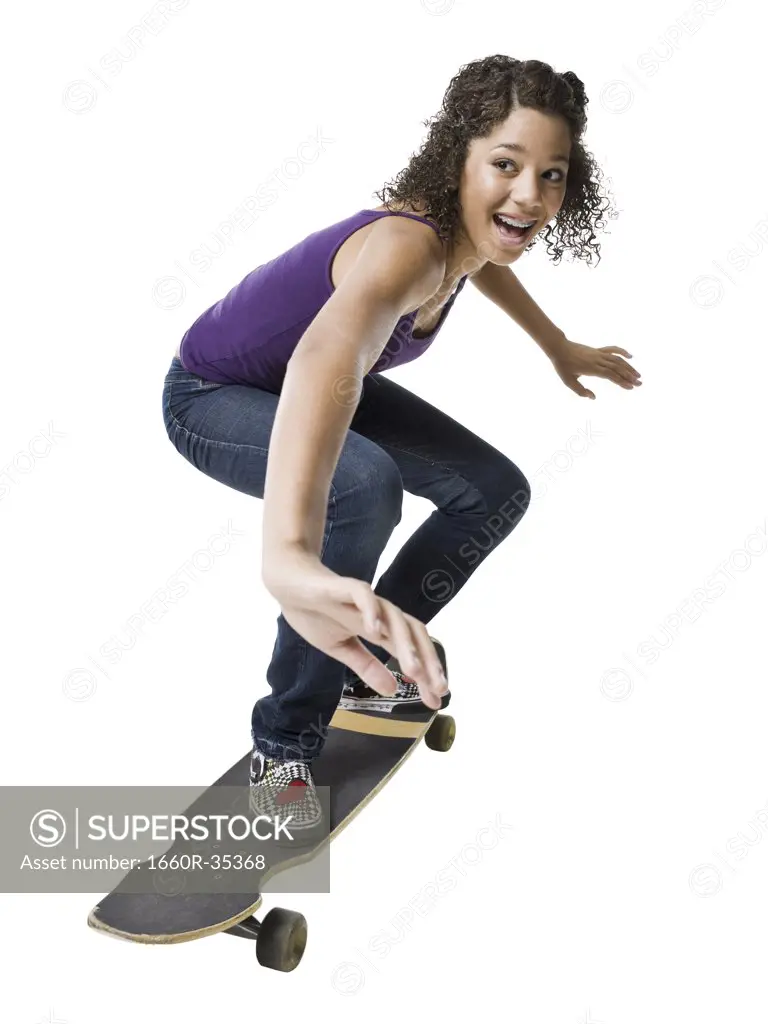 Girl with braces on skateboard