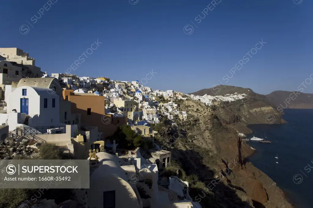 Aerial view of Greek village with wavy flag