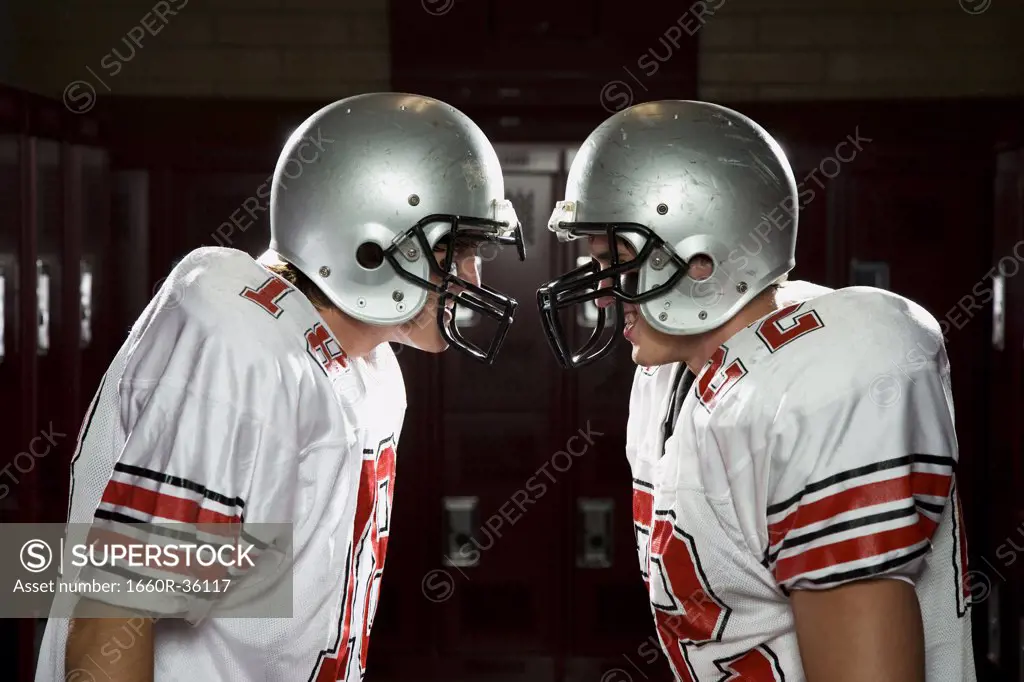 Two High School football players.