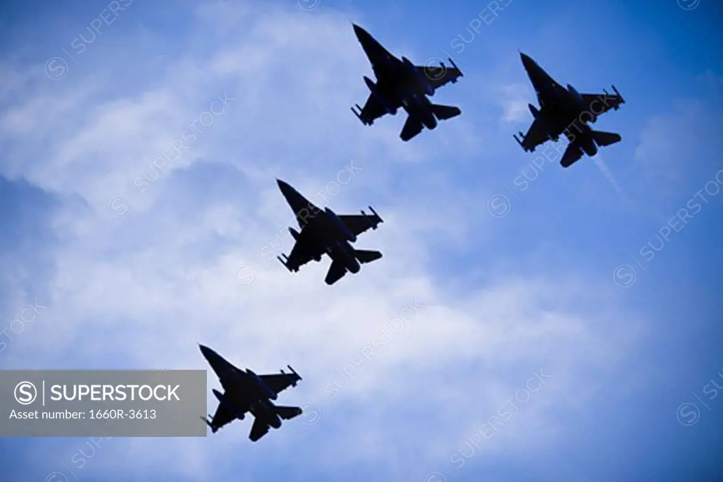 Low angle view of military aircrafts flying in the sky