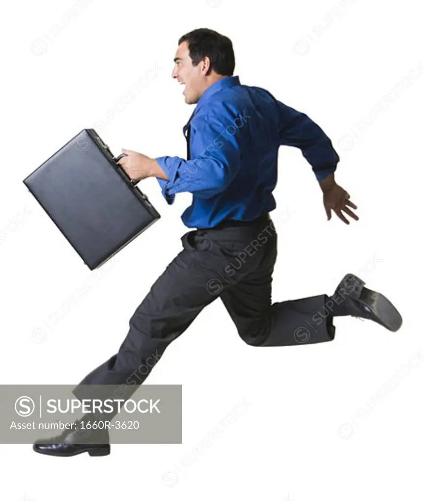 Portrait of a businessman jumping with a briefcase
