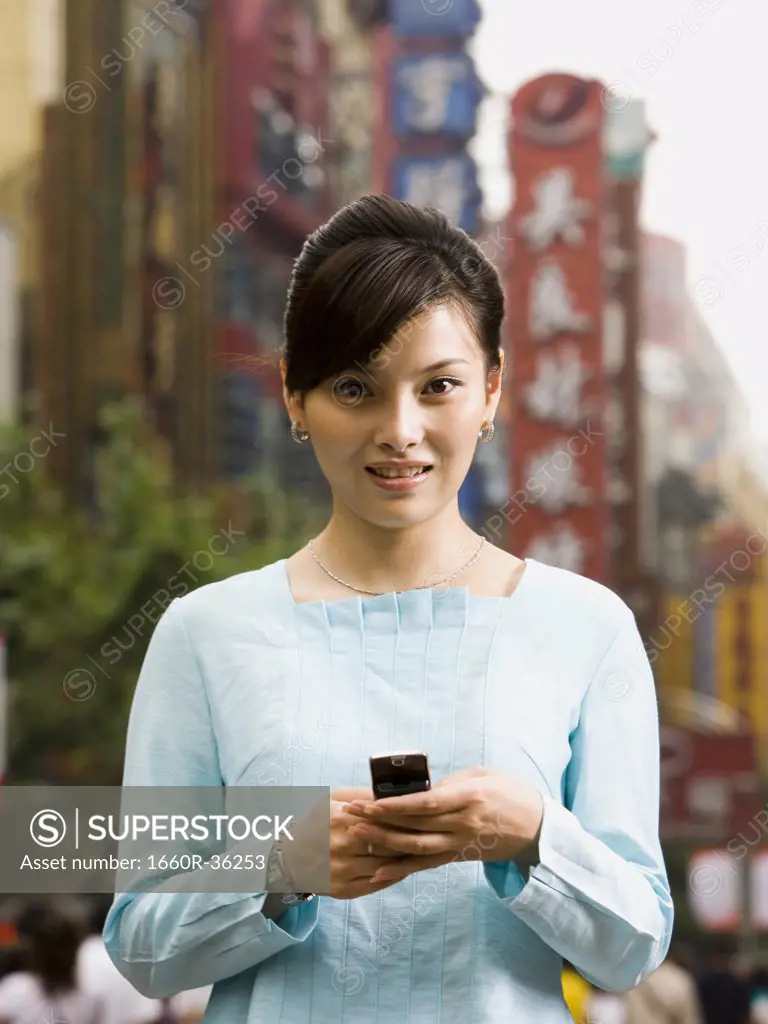 Woman with a cell phone.