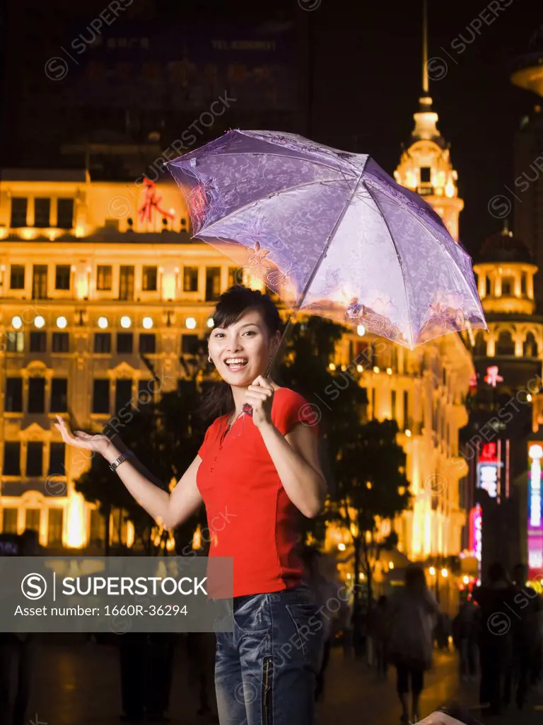 Young couple under an umbrella.