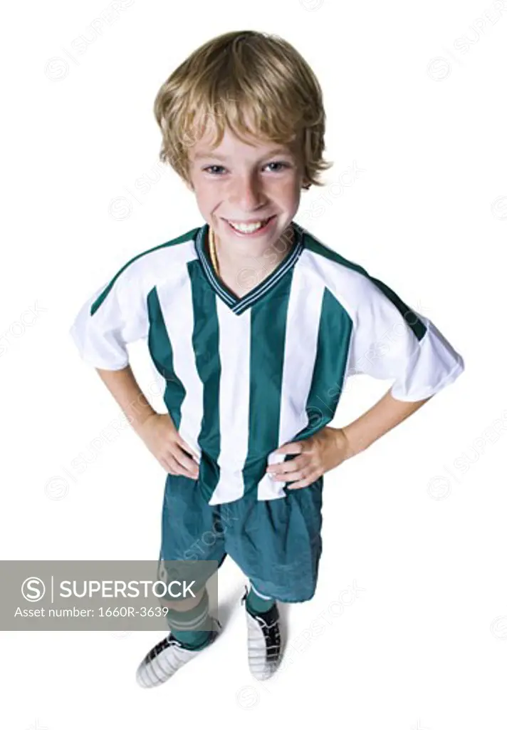 High angle view of a boy wearing soccer uniform