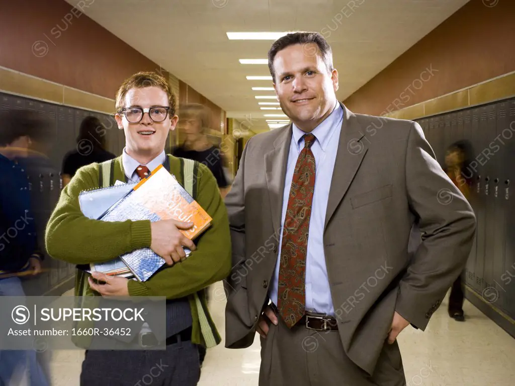 High School Principal stands with a student