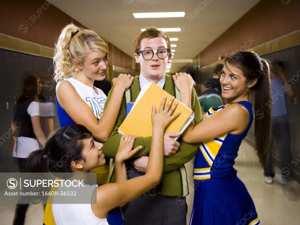 Three female and one male High School Students.