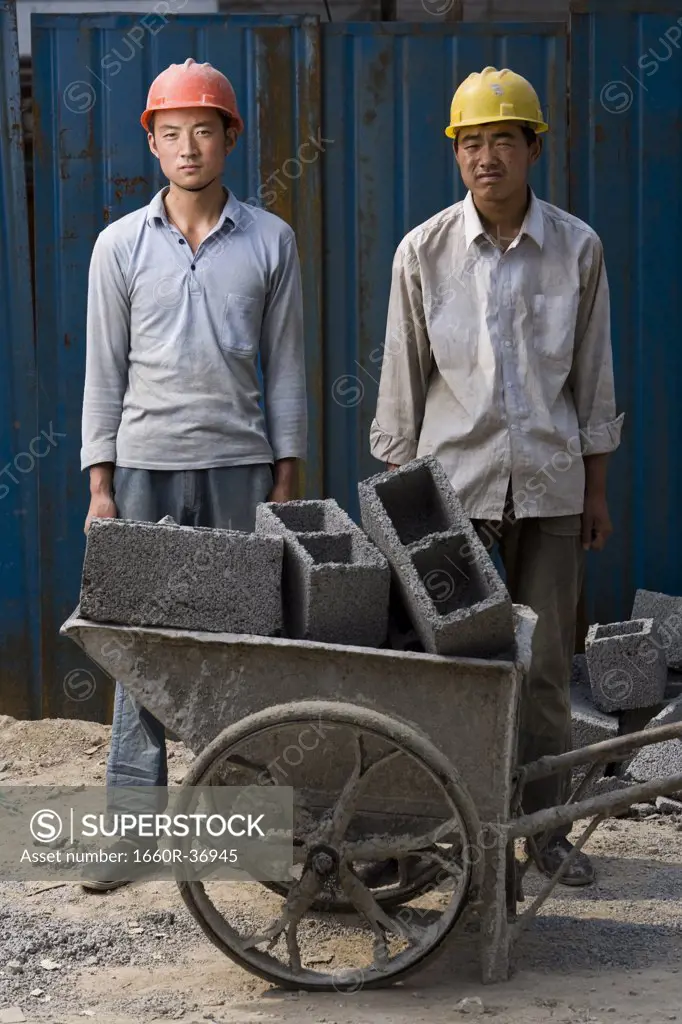 Two costruction workers on the job site.