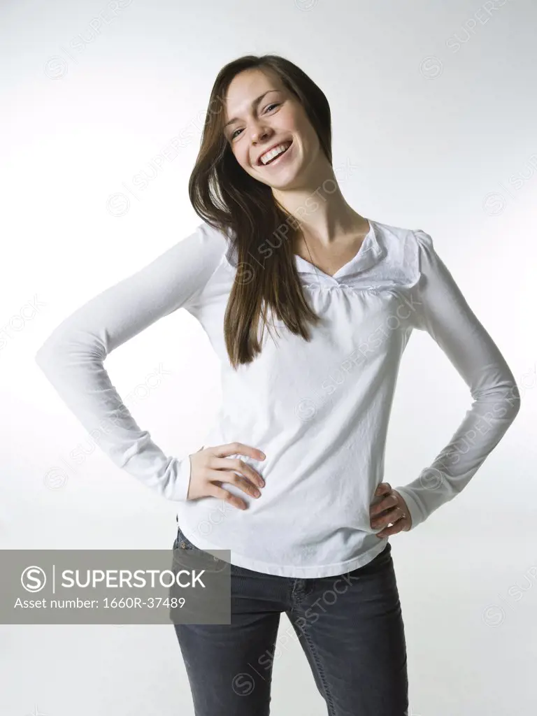 young woman with a white shirt, smiling.