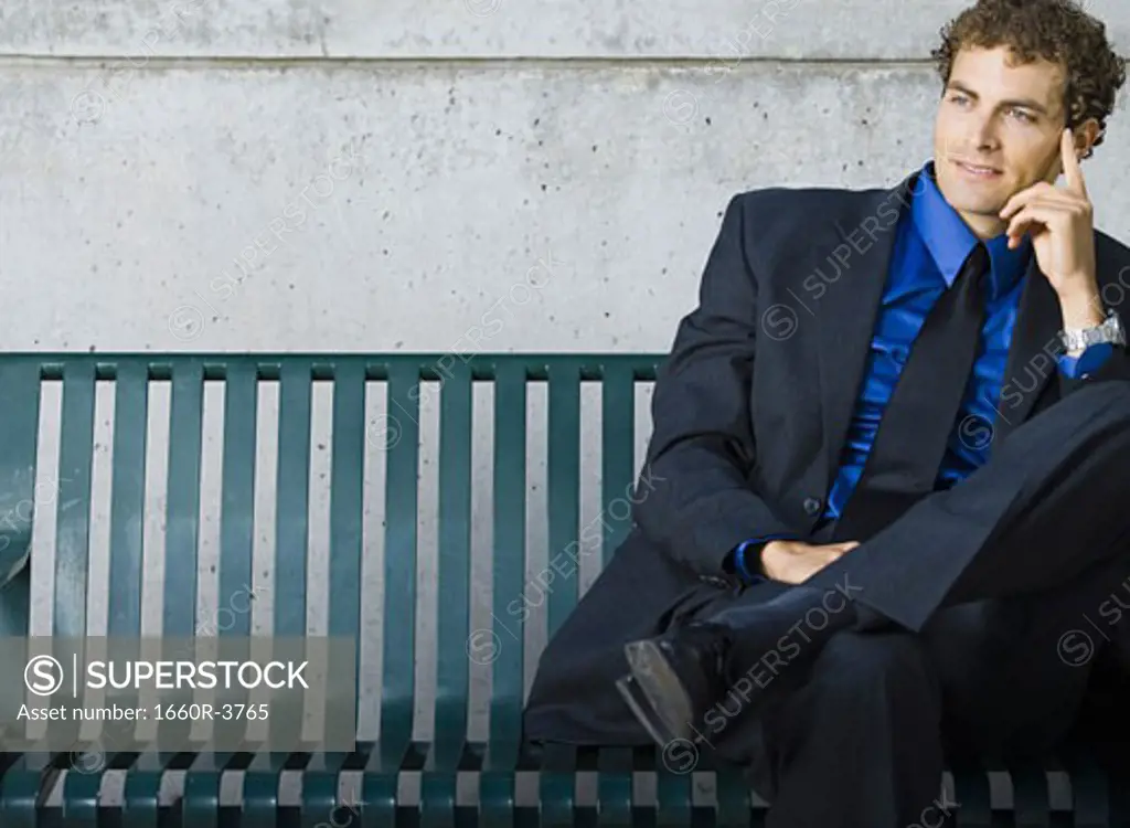 Businessman sitting on a bench