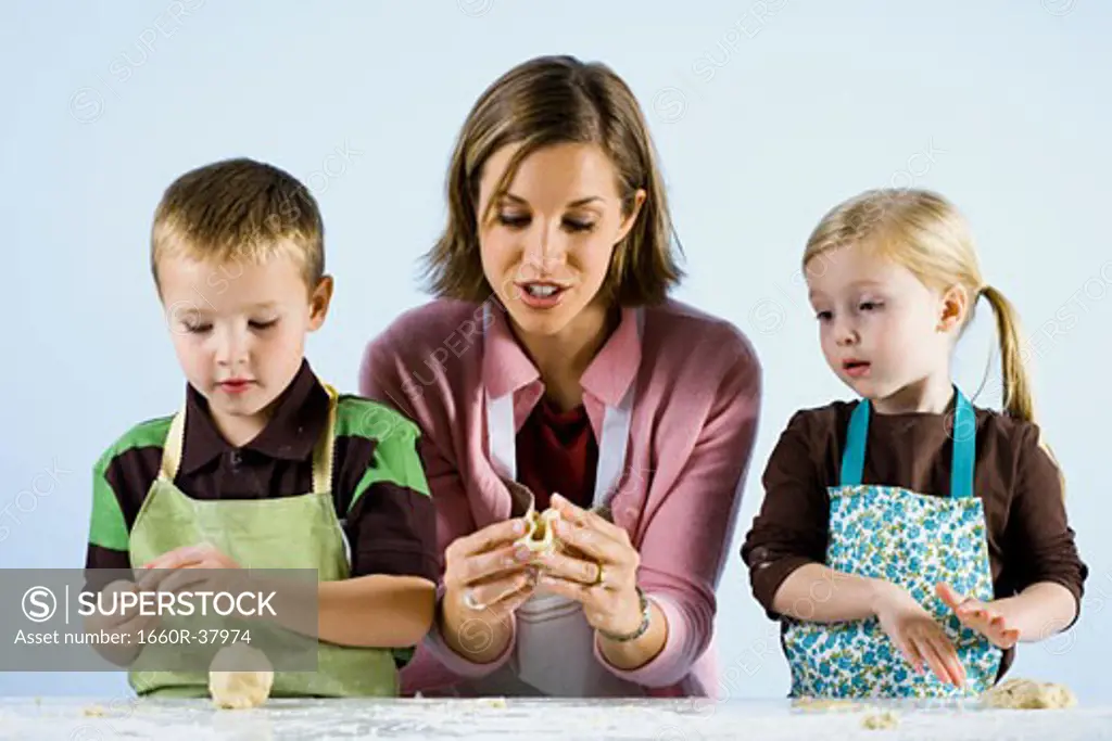 mother cooking with children