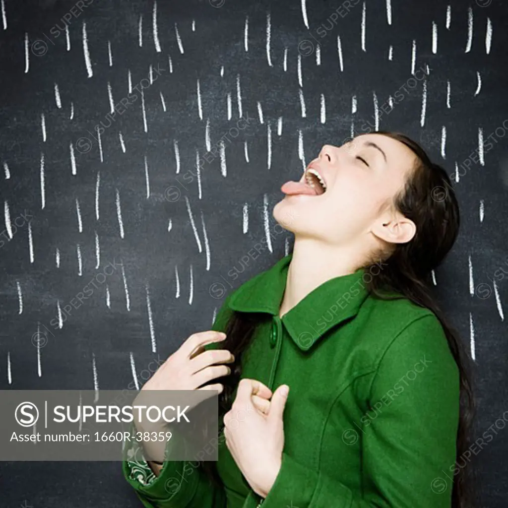 woman in a chalkboard rainstorm