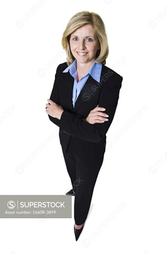High angle view of a businesswoman standing with her arms folded