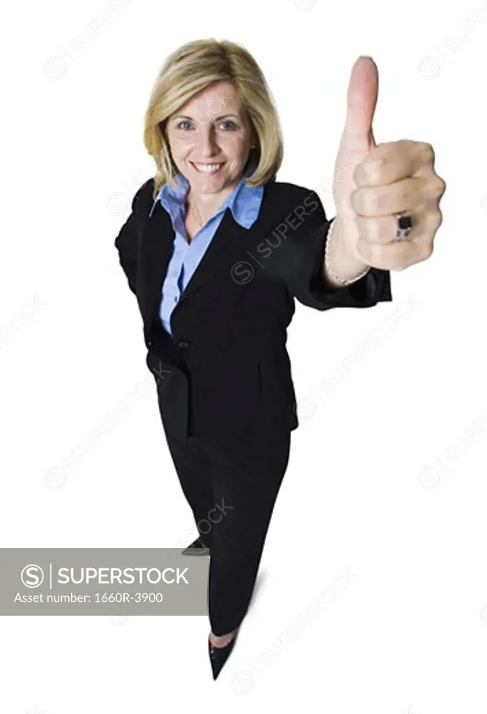 High angle view of a businesswoman showing thumbs up sign