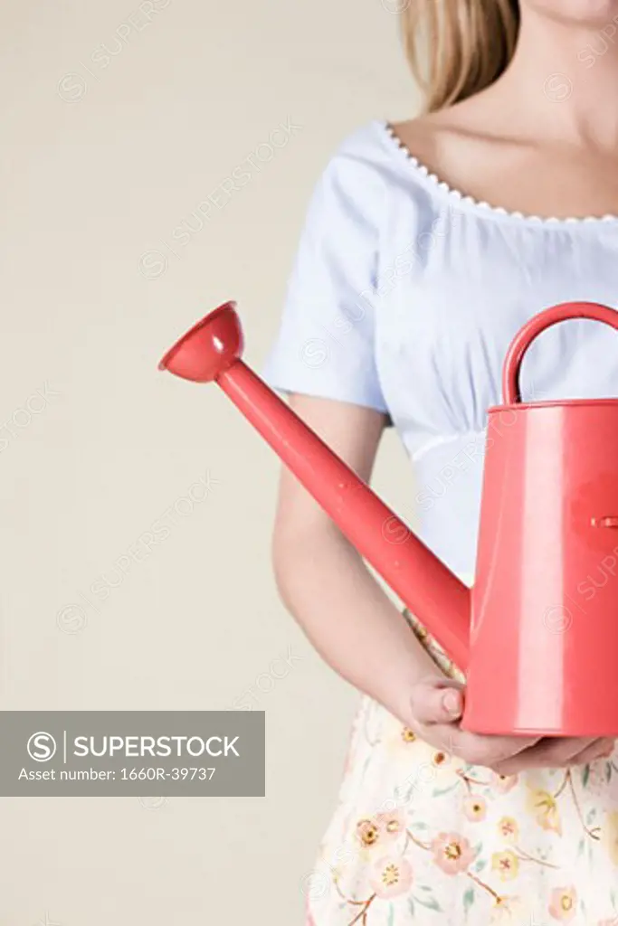 woman with a watering can
