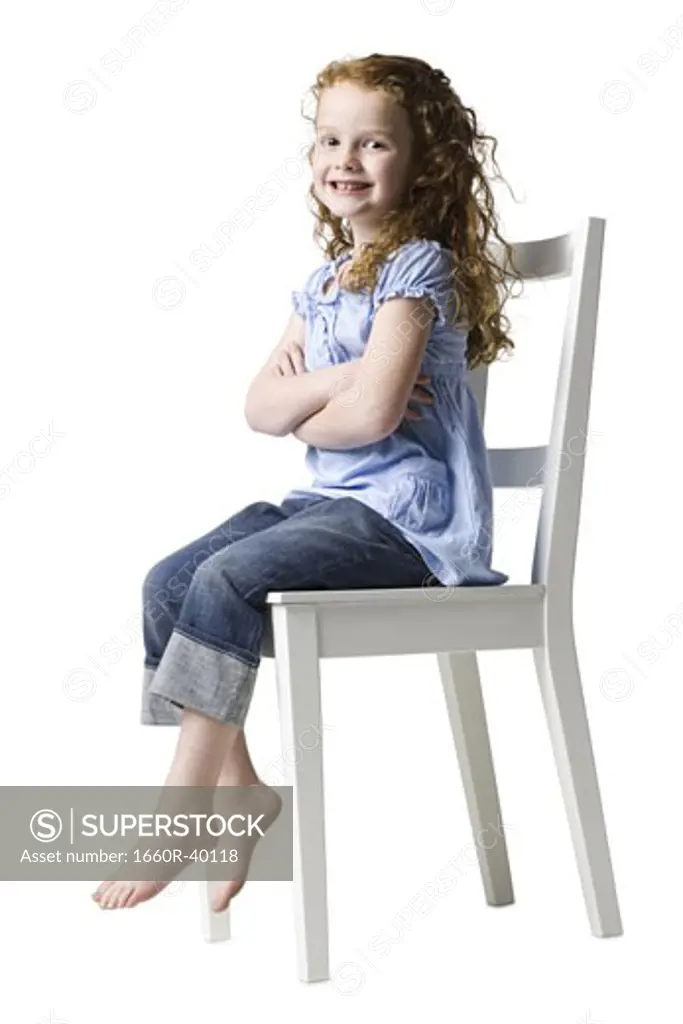 girl sitting in a chair