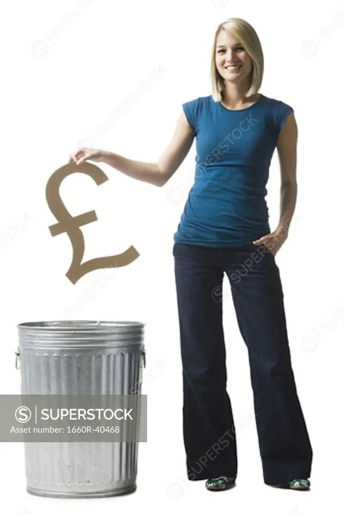 woman throwing pound symbol in the trash