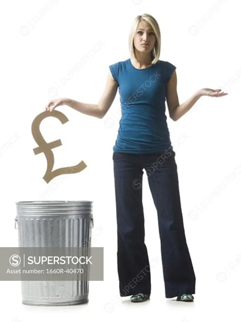 woman throwing pound symbol in the trash