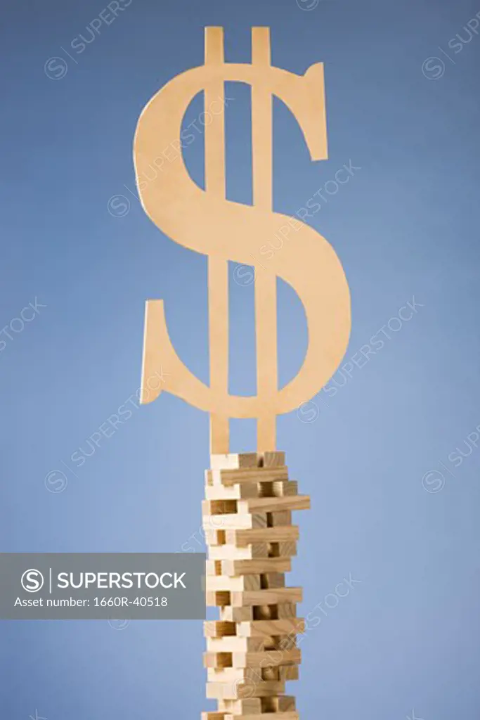 currency symbol on a tower of blocks