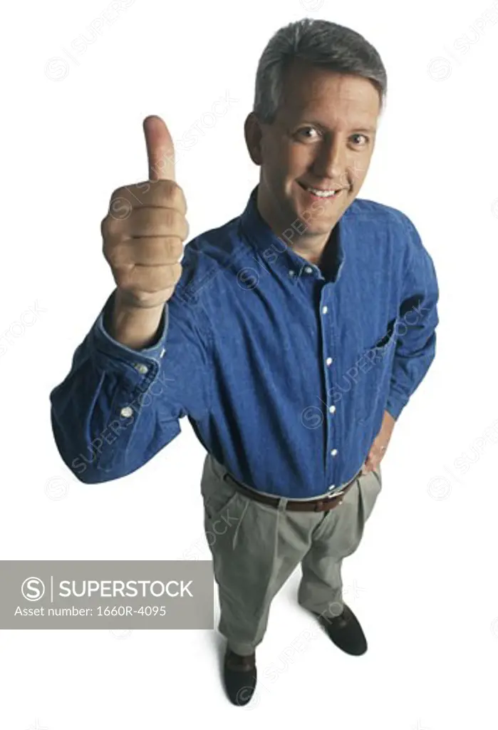 Portrait of a man giving a thumbs up