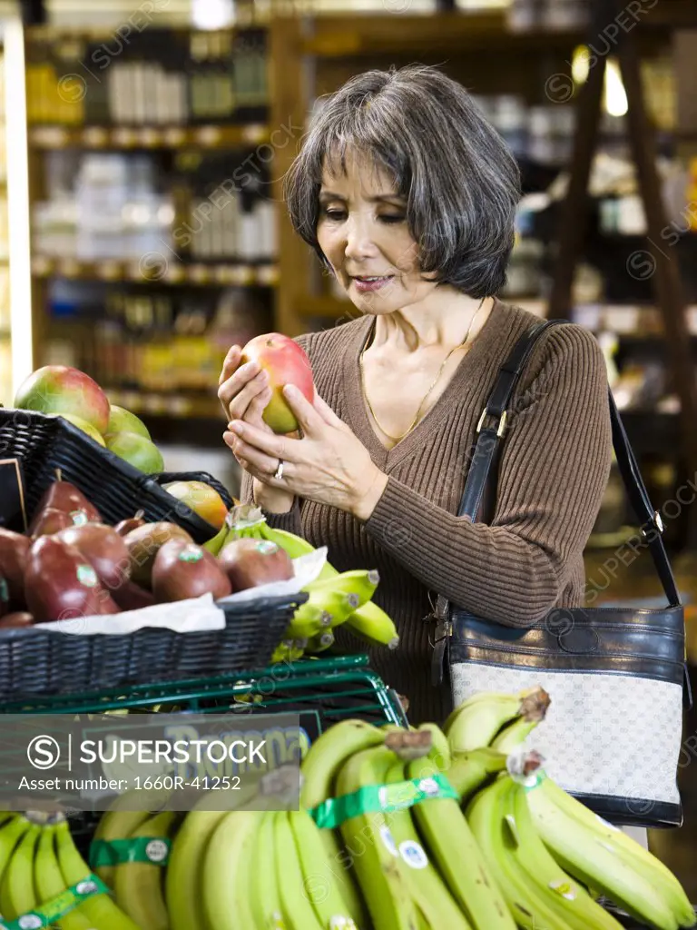 senior woman at the supermarket