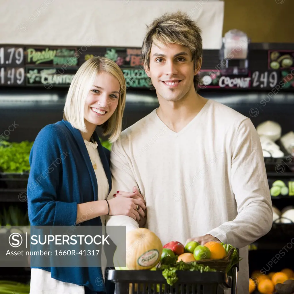 man and woman at the supermarket