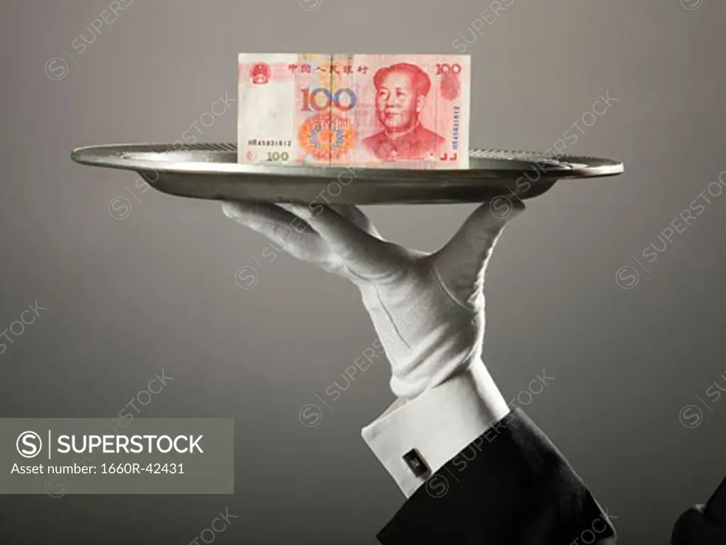 chinese yuan on a platter