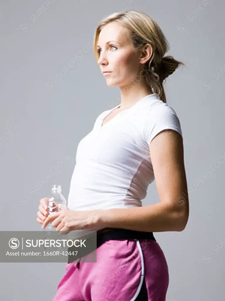woman in pink running shorts