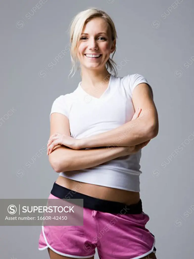 woman in pink running shorts