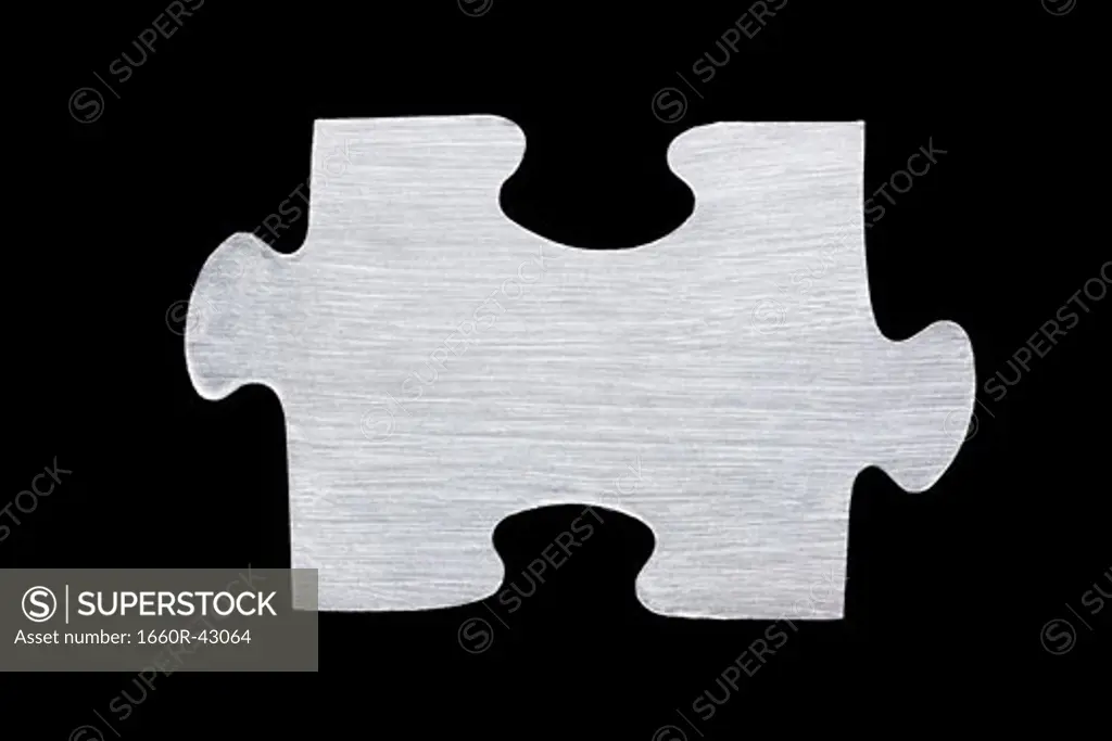 metallic puzzle piece