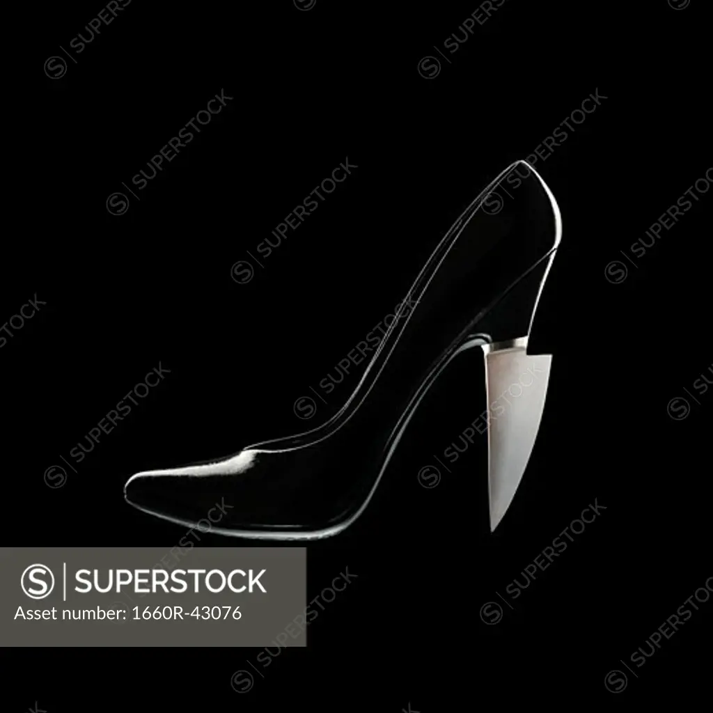 high heel with a kife blade for a heel
