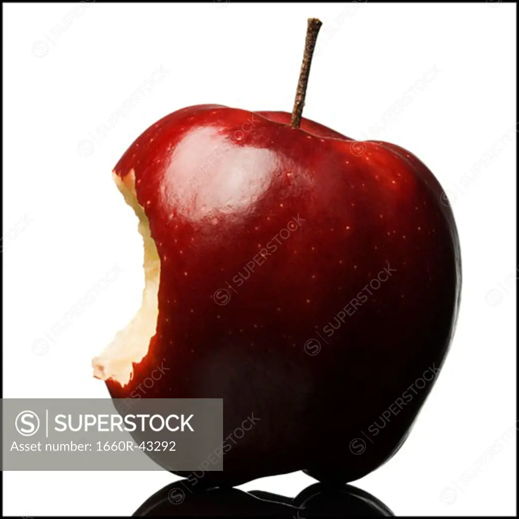 red apple with a bite out of it